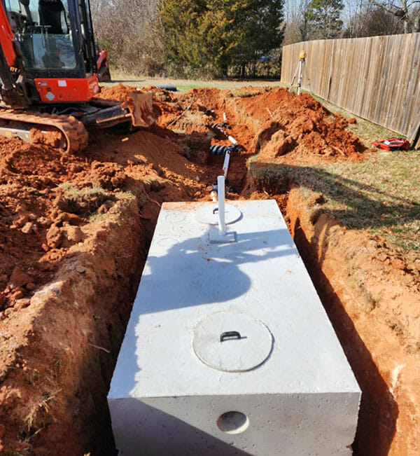 New septic tank being placed